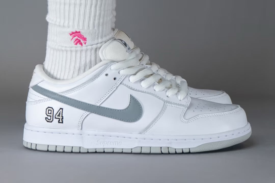 First Look at the Supreme x Nike SB Dunk Low “White” on Feet