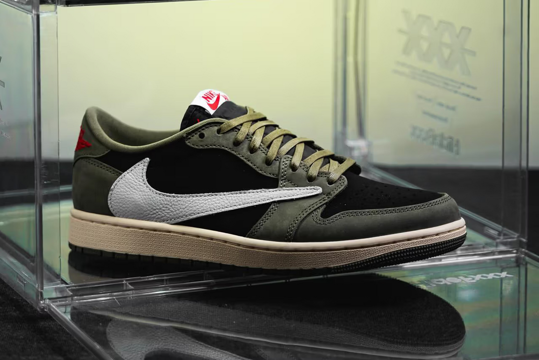 Initial glimpse of the "Black Olive" iteration of the Travis Scott x Air Jordan 1 Low OG.