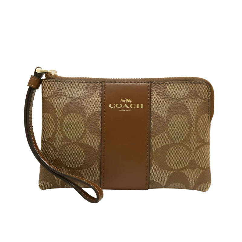 Coach Corner Zip Wristlet In Signature Canvas Khaki/Saddle | Hype Vault